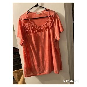Gently used soft pinkish/orange blouse from Cato. Fits like a 4.